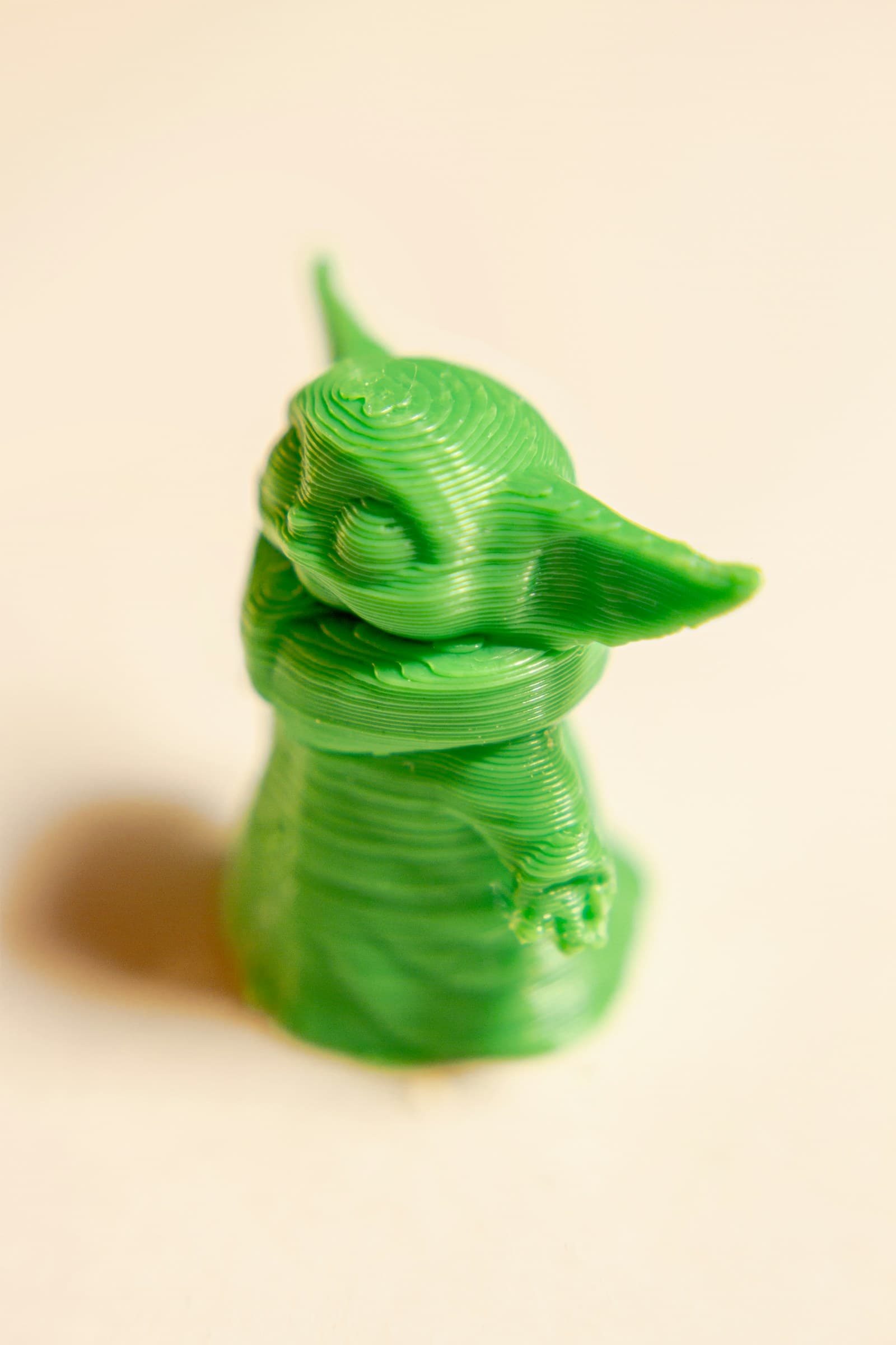 Finely detailed printed miniature figurine on a clean surface